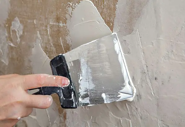 What role does cellulose play in wallpaper production and what characteristics can it improve? ​