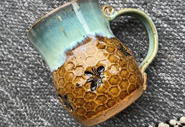 What is the main role of cellulose in the preparation process of honeycomb ceramics? ​